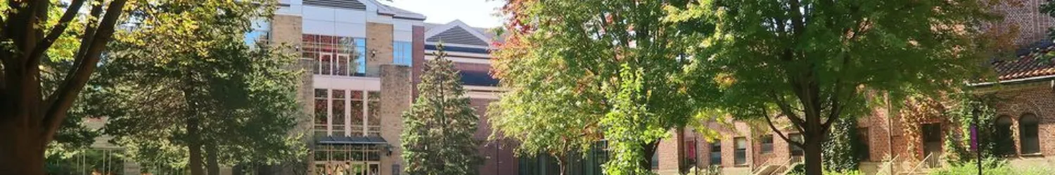 Grassy area in front of a building.